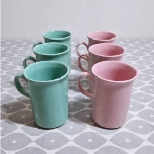 Setje vintage pastelkleurige mokken roos turkoois Churchill Engeland koffiemokken